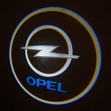 Підсвітка дверей авто Opel. Врізне лого Опель фото