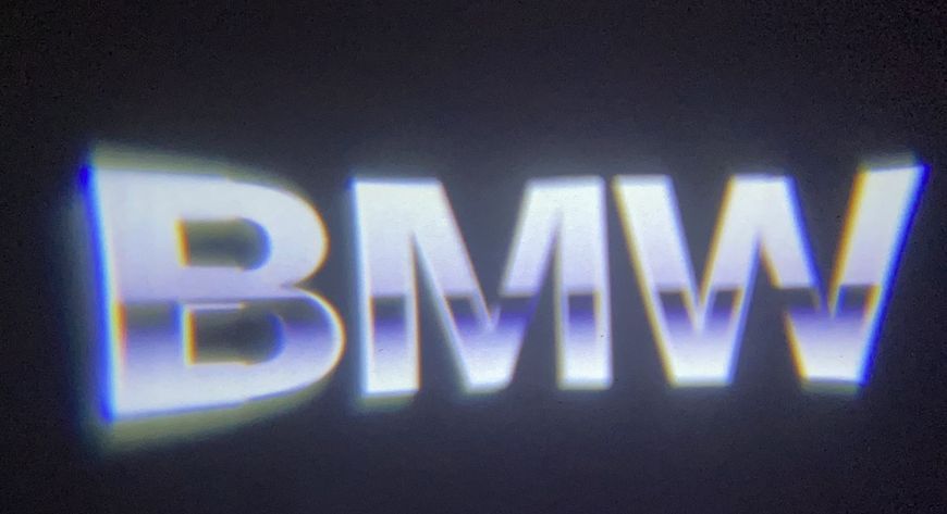 Логотип підсвітка дверей БМВ Lazer door logo light BMW Е60 Е65 Е70 Е90 F10 01 BMW Е60 Е70 Е90 F10 фото
