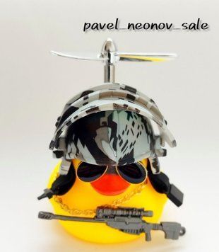 Качка в тачку автокачка. Іграшка качка з тік ток. Качечка Воїн Duck-1 фото