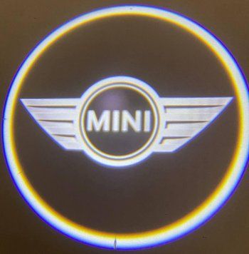 Логод на батарейках MINI. Бездротове лого дверцята-Міні. Lazer door logo. MINIr&mdash;безпровідне лого фото